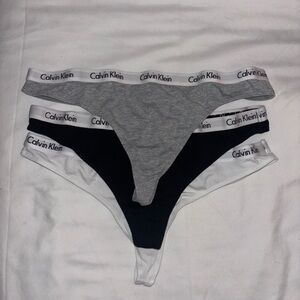 NWOT Calvin Klein Trio Thong Set
